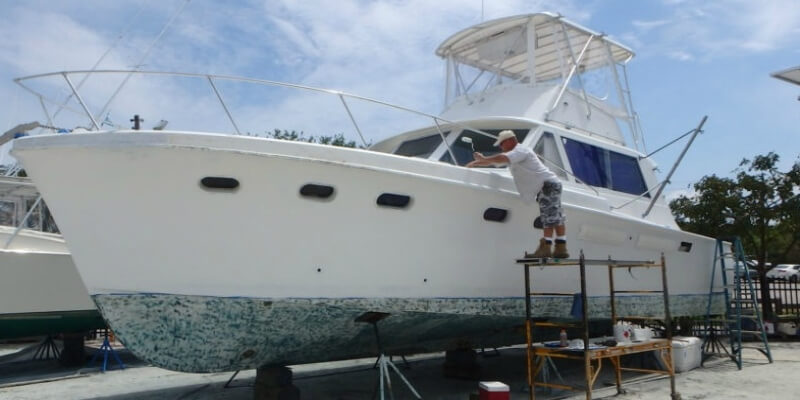 Boat repair inspection and marine survey in Stuart Florida marina.