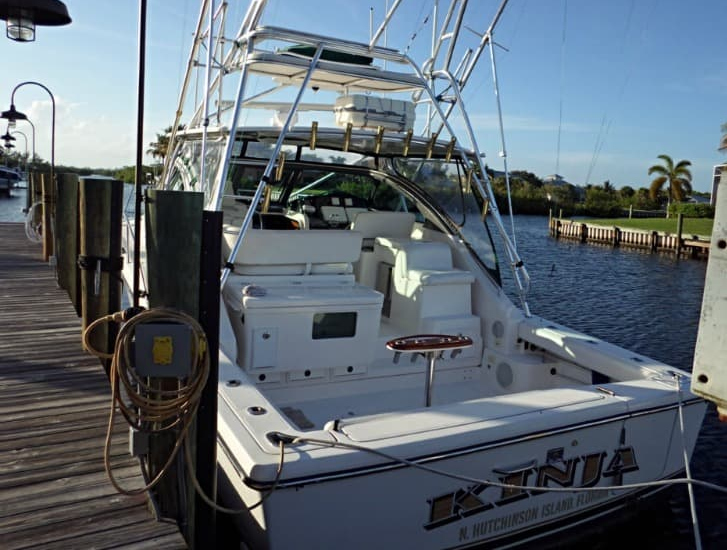 Sport fishing boat docked for pre-purchase marine survey in Stuart Florida.